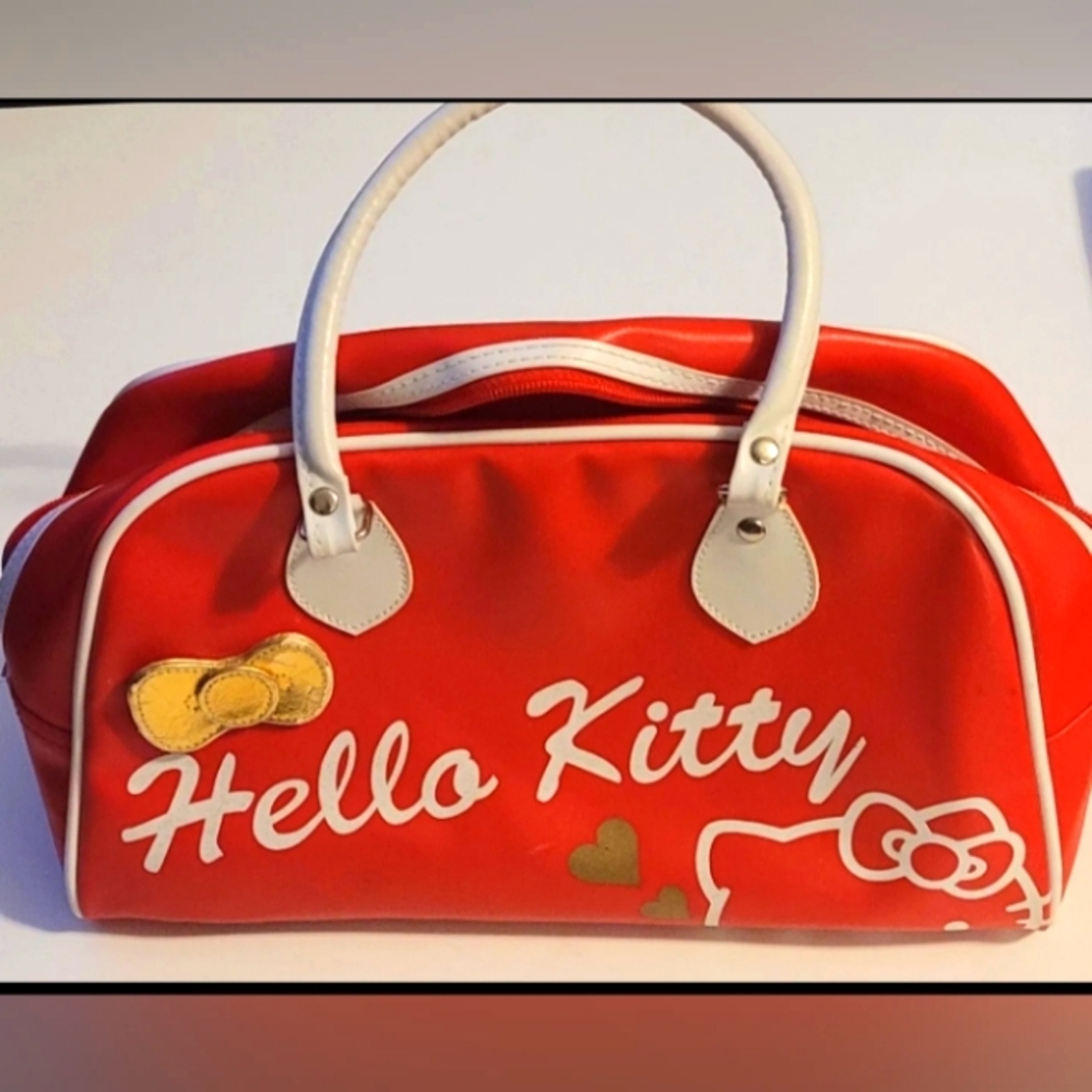 red hello kitty bowling bag style purse